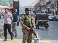 An Indian security personnel stands guard along a road in Srinagar, Jammu and Kashmir, on October 25, 2024. Security is increased across Kas...