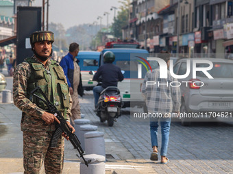 An Indian security personnel stands guard along a road in Srinagar, Jammu and Kashmir, on October 25, 2024. Security is increased across Kas...