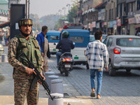 An Indian security personnel stands guard along a road in Srinagar, Jammu and Kashmir, on October 25, 2024. Security is increased across Kas...