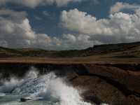 Andicuri Bay is a wide bay enclosed by coral-stone cliffs, some of which provide a little shade. Due to its perfect waves and stronger surf,...