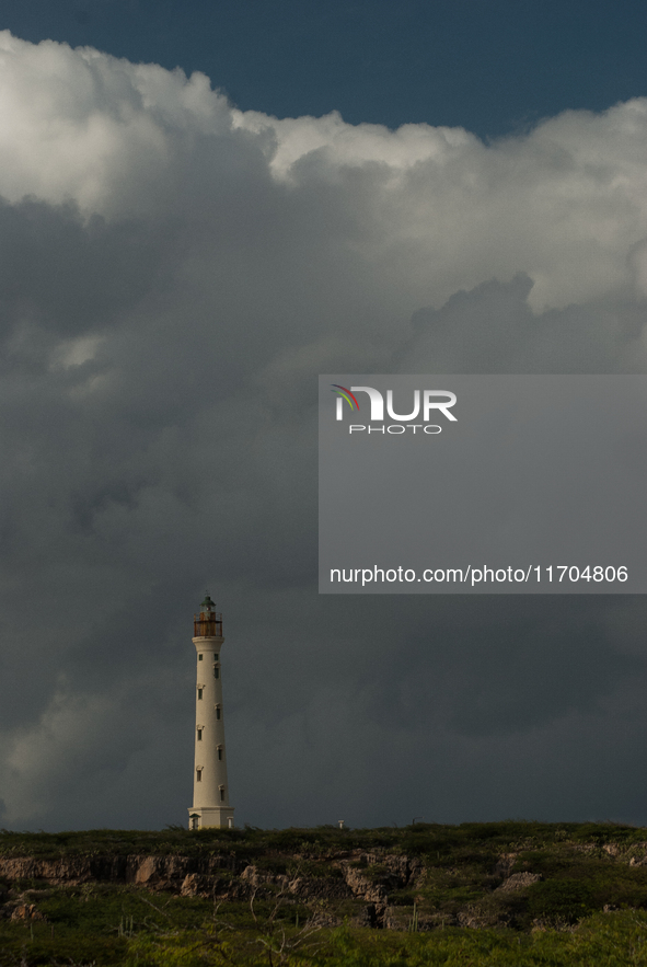 The California Lighthouse, known by locals as Faro, stands tall on a limestone plateau at Hudishibana, near Arashi Beach and Sasariwichi dun...