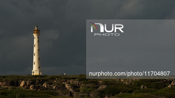 The California Lighthouse, known by locals as Faro, stands tall on a limestone plateau at Hudishibana, near Arashi Beach and Sasariwichi dun...