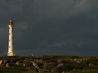 The California Lighthouse, known by locals as Faro, stands tall on a limestone plateau at Hudishibana, near Arashi Beach and Sasariwichi dun...