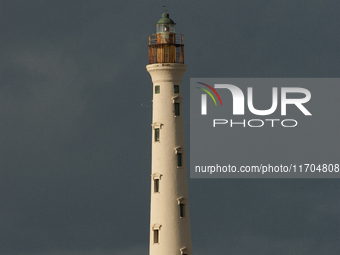 The California Lighthouse, known by locals as Faro, stands tall on a limestone plateau at Hudishibana, near Arashi Beach and Sasariwichi dun...