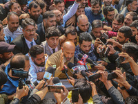 Member of Parliament Sheikh Abdul Rashid, also known as Engineer Rashid, (C) talks with members of the media during a protest in Srinagar, J...