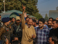 Member of Parliament Sheikh Abdul Rashid, also known as Engineer Rashid, (C) shouts slogans during a protest in Srinagar, Jammu and Kashmir,...