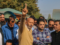 Member of Parliament Sheikh Abdul Rashid, also known as Engineer Rashid, (C) shouts slogans during a protest in Srinagar, Jammu and Kashmir,...