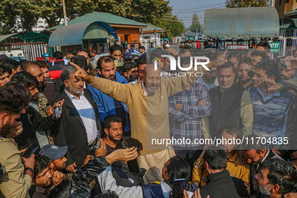 Member of Parliament Sheikh Abdul Rashid, also known as Engineer Rashid, (C) shouts slogans during a protest in Srinagar, Jammu and Kashmir,...