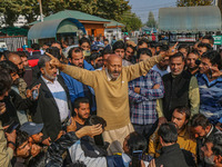 Member of Parliament Sheikh Abdul Rashid, also known as Engineer Rashid, (C) shouts slogans during a protest in Srinagar, Jammu and Kashmir,...