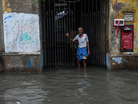 A flooded road is seen in Kolkata, India, on October 25, 2024, after heavy rain brought by the landfall of Cyclone Dana. Cyclone Dana makes...