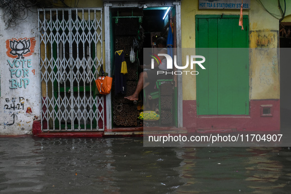 A flooded road is seen in Kolkata, India, on October 25, 2024, after heavy rain brought by the landfall of Cyclone Dana. Cyclone Dana makes...