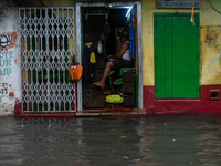 A flooded road is seen in Kolkata, India, on October 25, 2024, after heavy rain brought by the landfall of Cyclone Dana. Cyclone Dana makes...