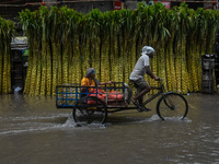 A flooded road is seen in Kolkata, India, on October 25, 2024, after heavy rain brought by the landfall of Cyclone Dana. Cyclone Dana makes...