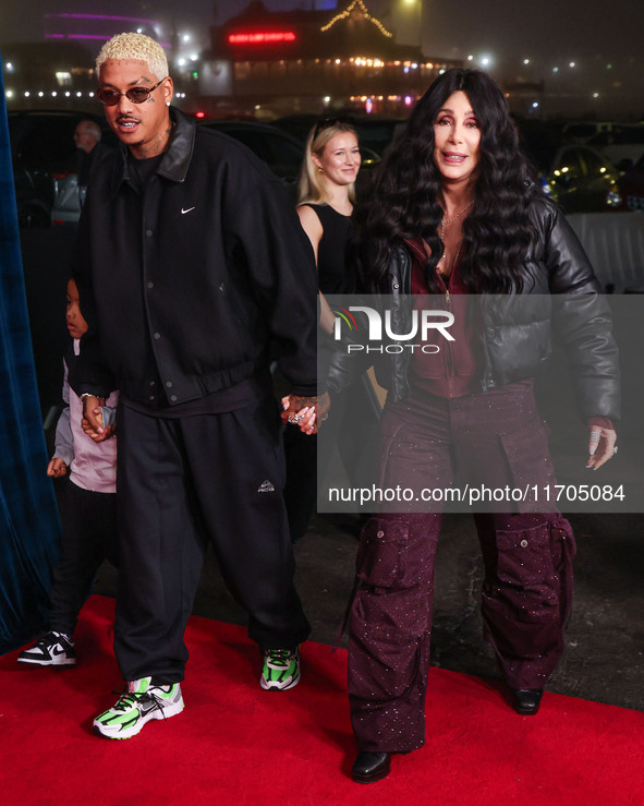 Slash Electric Alexander Edwards, Alexander Edwards and Cher arrive at Cirque du Soleil's 'KOOZA' Red Carpet Premiere held at the Santa Moni...