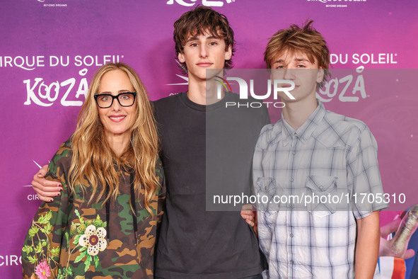 Kim Raver, son Leo Boyer and Kai arrive at Cirque du Soleil's 'KOOZA' Red Carpet Premiere held at the Santa Monica Pier on October 24, 2024...