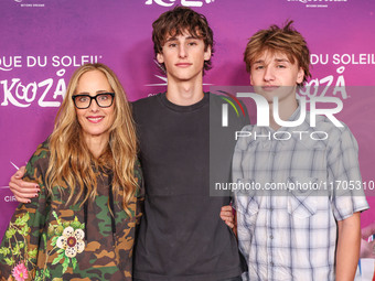 Kim Raver, son Leo Boyer and Kai arrive at Cirque du Soleil's 'KOOZA' Red Carpet Premiere held at the Santa Monica Pier on October 24, 2024...