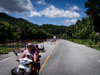 Motorists pass through a checkpoint in Pattani. Daily life in Tak Bai, Narathiwat, Thailand, on October 25, 2024. Tak Bai is the site of an...