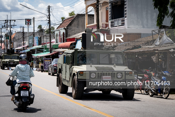 Soldiers in an APC patrol Tak Bai town. Daily life in Tak Bai, Narathiwat, Thailand, on October 25, 2024. Tak Bai is the site of an incident...