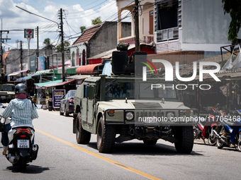 Soldiers in an APC patrol Tak Bai town. Daily life in Tak Bai, Narathiwat, Thailand, on October 25, 2024. Tak Bai is the site of an incident...