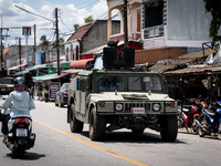 Soldiers in an APC patrol Tak Bai town. Daily life in Tak Bai, Narathiwat, Thailand, on October 25, 2024. Tak Bai is the site of an incident...