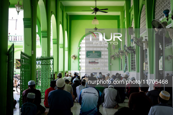 Muslims pray at Ihsaniyah Mosque in Tak Bai. Daily life in Tak Bai, Narathiwat, Thailand, on October 25, 2024, continues as the statute of l...