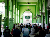 Muslims pray at Ihsaniyah Mosque in Tak Bai. Daily life in Tak Bai, Narathiwat, Thailand, on October 25, 2024, continues as the statute of l...