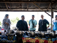 Customers grab lunch after praying at a mosque in Tak Bai. Daily life in Tak Bai, Narathiwat, Thailand, on October 25, 2024, reflects the hi...