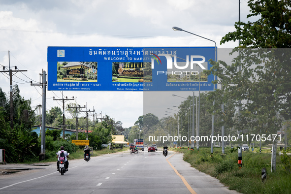 A sign welcomes motorists to Narathiwat province. Daily life occurs in Tak Bai, Narathiwat, Thailand, on October 25, 2024. Tak Bai is the si...