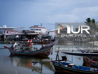 Longtail fishing boats park near the fisherman's village area of Narathiwat. Daily life in Tak Bai, Narathiwat, Thailand, on October 25, 202...