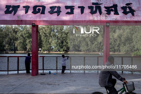 Children fish at the park in Narathiwat. Daily life in Tak Bai, Narathiwat, Thailand, on October 25, 2024. Tak Bai is the site of an inciden...