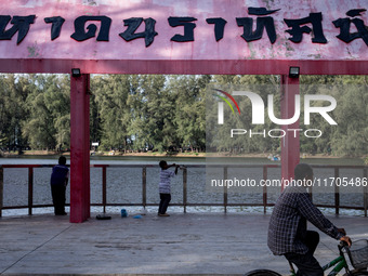 Children fish at the park in Narathiwat. Daily life in Tak Bai, Narathiwat, Thailand, on October 25, 2024. Tak Bai is the site of an inciden...