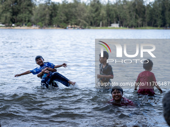 Children play in the sea in Narathiwat. Daily life in Tak Bai, Narathiwat, Thailand, on October 25, 2024. Tak Bai is the site of an incident...