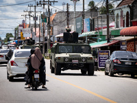 Soldiers in an APC patrol Tak Bai town. Daily life in Tak Bai, Narathiwat, Thailand, on October 25, 2024. Tak Bai is the site of an incident...