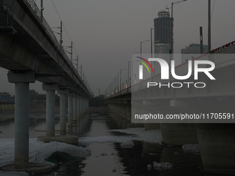 Toxic frothing is seen in the Yamuna River at Kalindi Kunj in New Delhi, India, on October 25, 2024. (