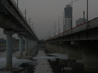 Toxic frothing is seen in the Yamuna River at Kalindi Kunj in New Delhi, India, on October 25, 2024. (