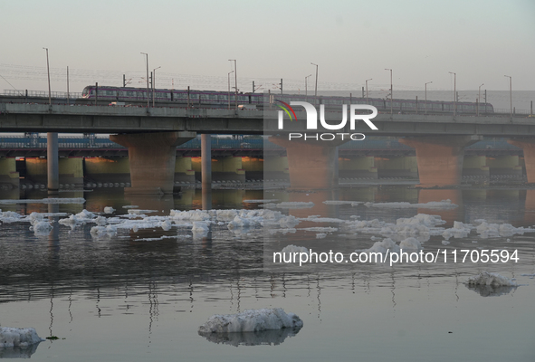 Toxic frothing is seen in the Yamuna River at Kalindi Kunj in New Delhi, India, on October 25, 2024. 