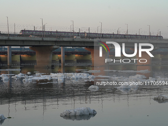 Toxic frothing is seen in the Yamuna River at Kalindi Kunj in New Delhi, India, on October 25, 2024. (