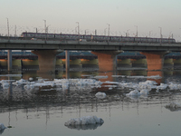 Toxic frothing is seen in the Yamuna River at Kalindi Kunj in New Delhi, India, on October 25, 2024. (