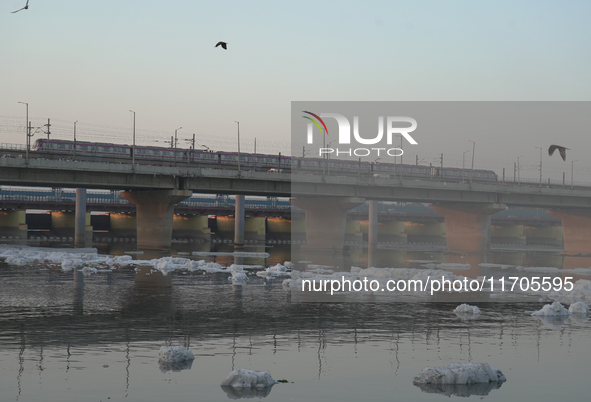 Toxic frothing is seen in the Yamuna River at Kalindi Kunj in New Delhi, India, on October 25, 2024. 