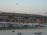 Toxic frothing is seen in the Yamuna River at Kalindi Kunj in New Delhi, India, on October 25, 2024. (