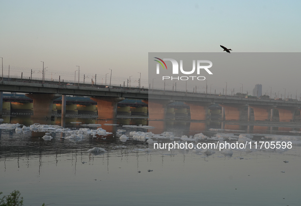 Toxic frothing is seen in the Yamuna River at Kalindi Kunj in New Delhi, India, on October 25, 2024. 