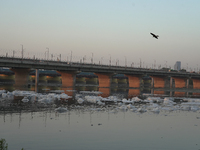 Toxic frothing is seen in the Yamuna River at Kalindi Kunj in New Delhi, India, on October 25, 2024. (