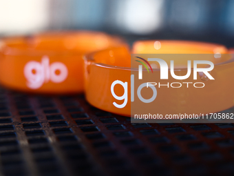 Glo logo is seen on ashtrays in Krakow, Poland on October 25, 2024. (