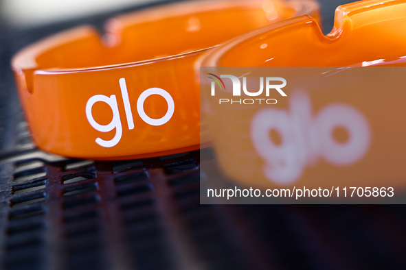 Glo logo is seen on ashtrays in Krakow, Poland on October 25, 2024. 