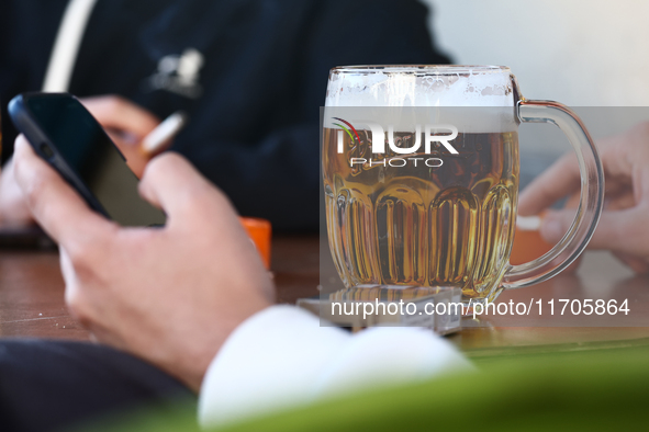 A mug of beer is seen on a table in Krakow, Poland on October 25, 2024. 