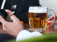 A mug of beer is seen on a table in Krakow, Poland on October 25, 2024. (