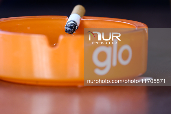 Glo logo is seen on ashtrays in Krakow, Poland on October 25, 2024. 