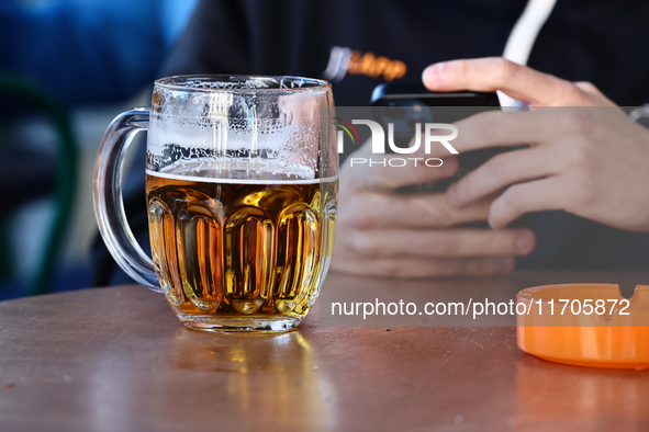 A mug of beer is seen on a table in Krakow, Poland on October 25, 2024. 