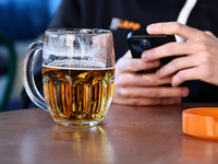 A mug of beer is seen on a table in Krakow, Poland on October 25, 2024. (