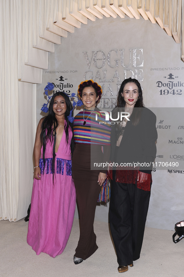 Yalitza Aparicio, Karla Martinez de Salas, and Zuria Vega attend the red carpet for the Vogue Dia de Muertos Gala at Palacio de Mineria in M...